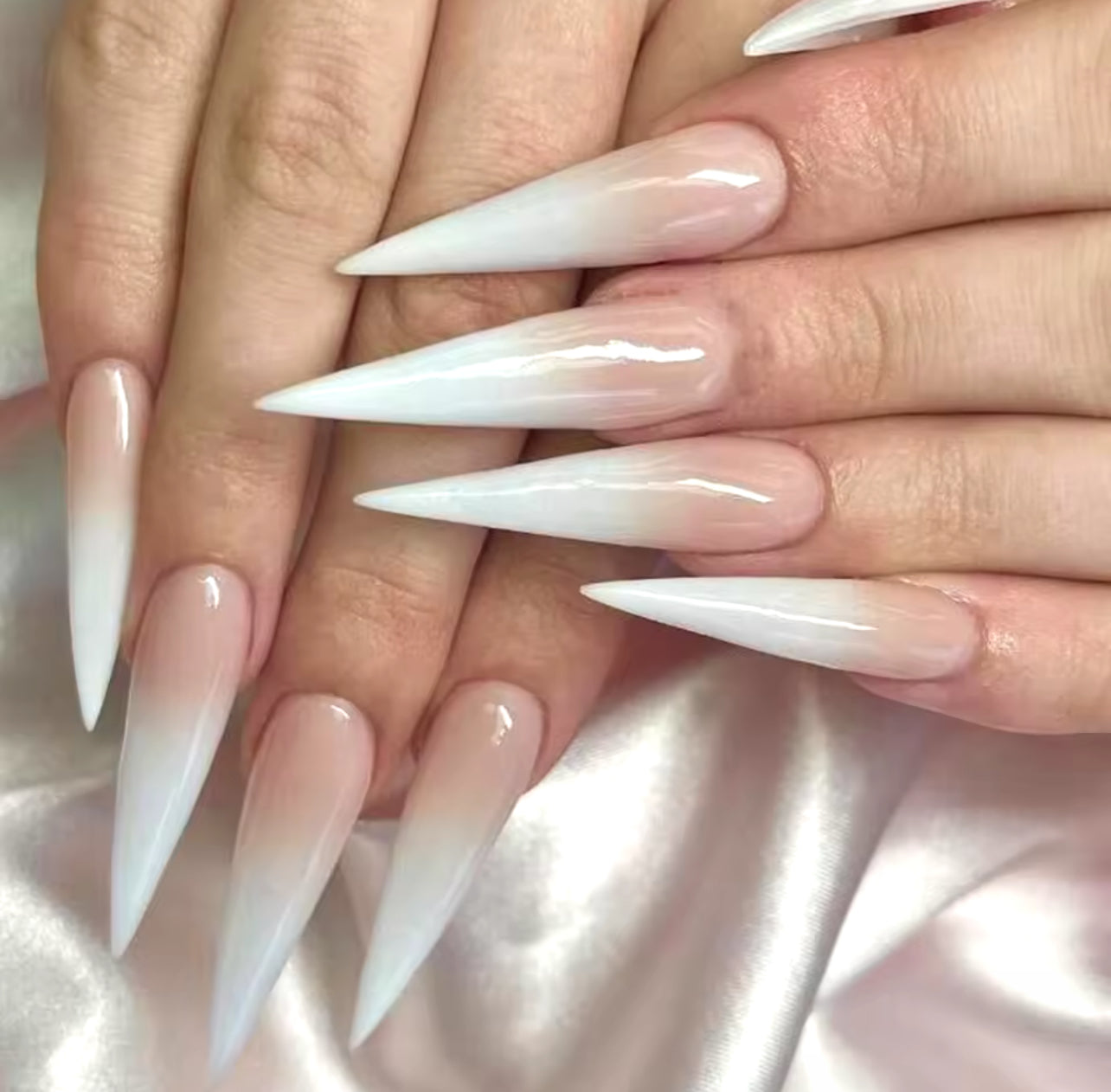 Long stiletto nails nude